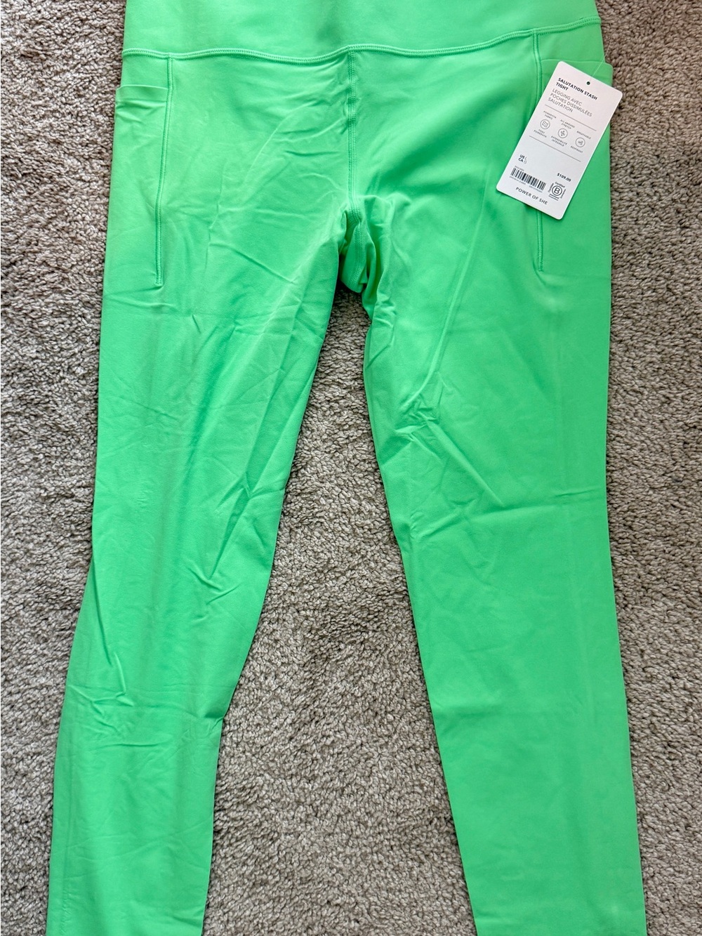 Athleta Bright Green Salutation Stash Leggings with Side Pockets